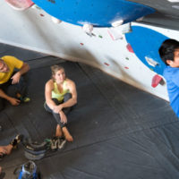 group encouraging male wall climber at Inner Peaks Climbing & Fitness Charlotte NC